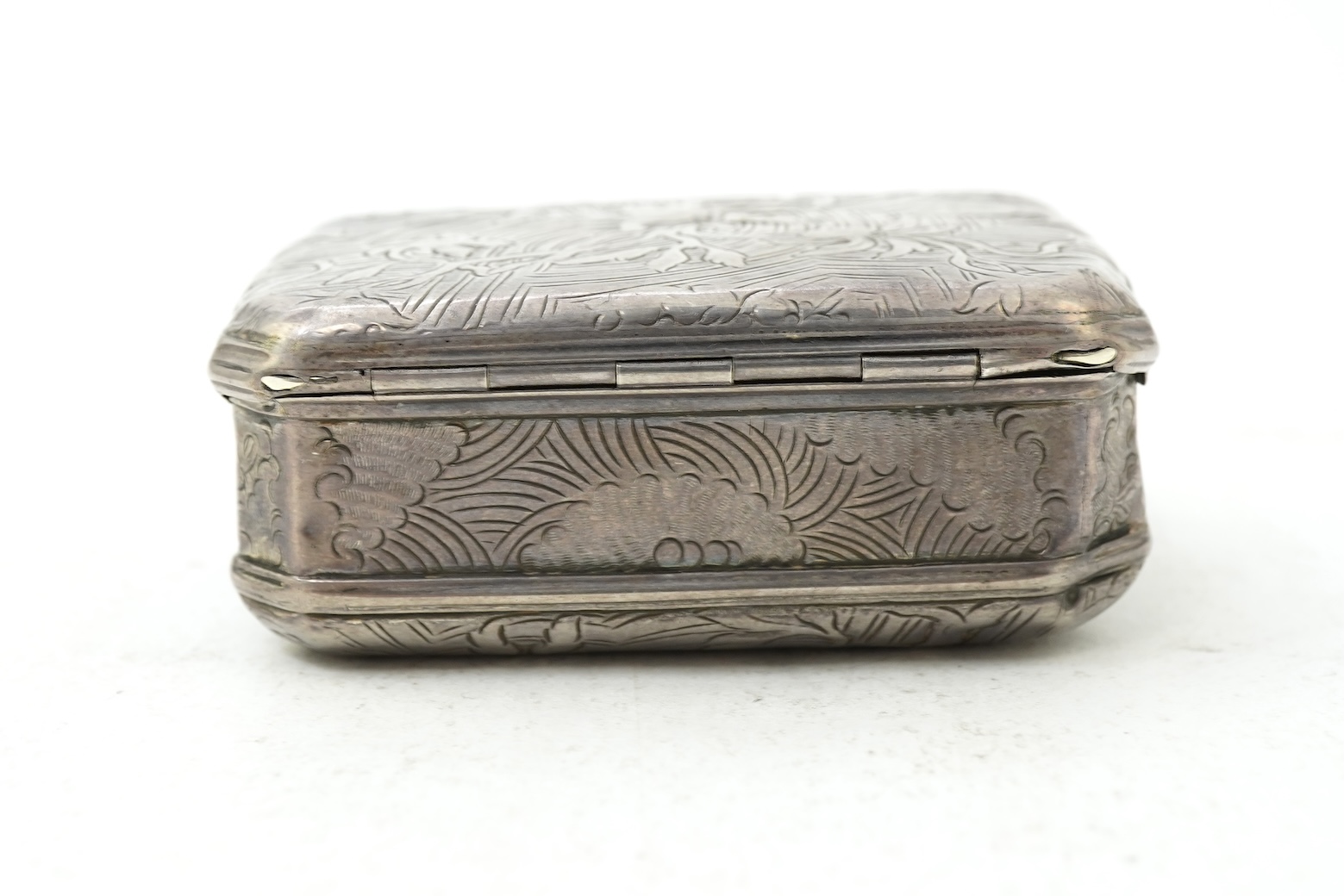 An early 19th century French white metal snuff box, with hinged cover